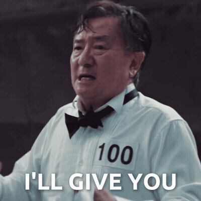 Man In Tuxedo With 100 On Shirt Says I'll Give You GIF