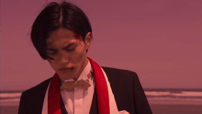 Man In Tuxedo With Blood On Face GIF