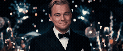 Man In Tuxedo With Bow Tie Smiles GIF