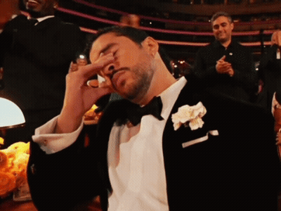 Man In Tuxedo With Flower In Pocket GIF