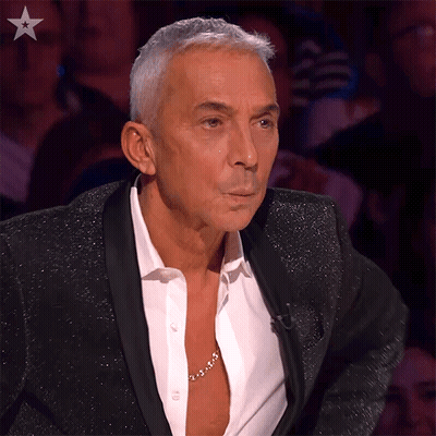 Man In Tuxedo With Gold Chain GIF