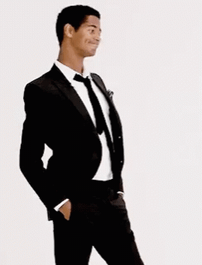 Man In Tuxedo With Hands In Pockets GIF