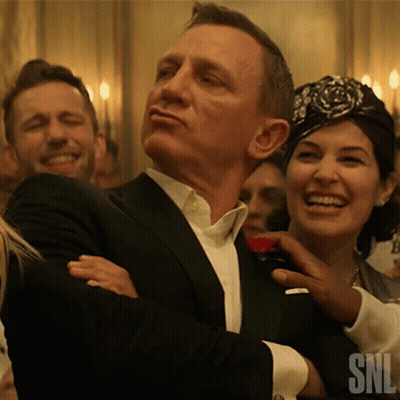 Man In Tuxedo With SNL Logo GIF