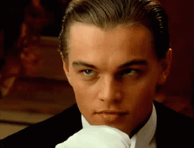 Man In Tuxedo With White Gloves Close Up GIF