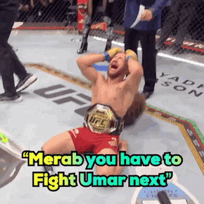 Man In UFC Belt Laying On Ground GIF