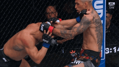 Man In UFC Glove Fighting Another GIF