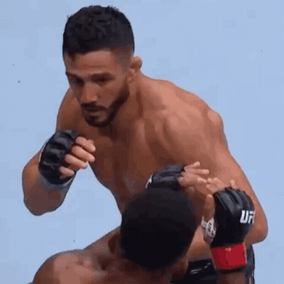 Man In UFC Glove Fighting Another Man In Wrestling Match GIF