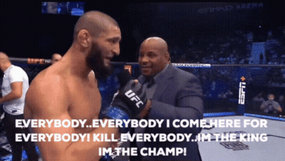 Man In UFC Glove Talking To Suit GIF