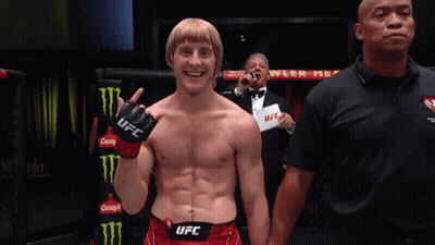 Man In UFC Gloves Next To Referee GIF