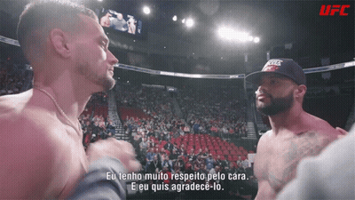 Man In UFC Hat Talking In Boxing Ring GIF