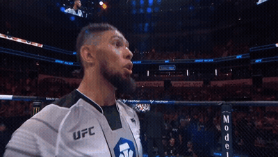 Man In UFC Jersey In Front Of Crowd GIF