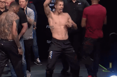 Man In UFC Pants Standing Before Crowd GIF
