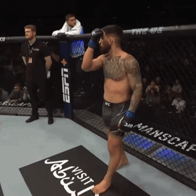 Man In UFC Ring In Front Of ESPN Banner GIF