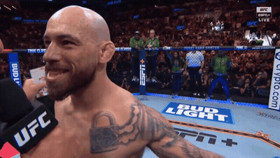 Man In UFC Ring With Bud Light Sign GIF