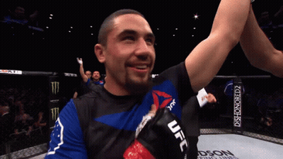 Man In UFC Shirt High Fiving Another Man GIF
