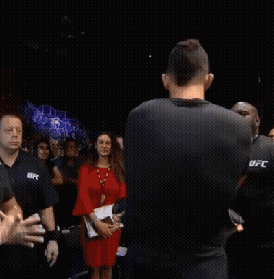 Man In UFC Shirt Next To Shirtless Man GIF