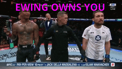 Man In UFC Shirt Standing Before Referee GIF