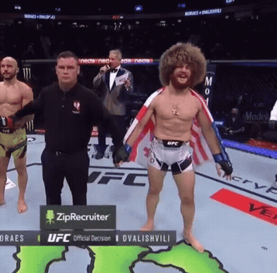 Man In UFC Uniform On Boxing Ring GIF