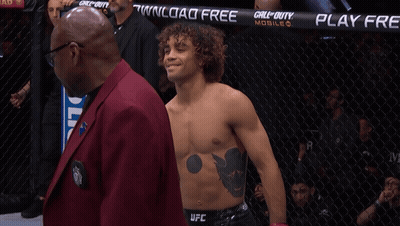 Man In UFC Uniform Says Play Free GIF