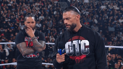 Man In UIC Sweatshirt In Wrestling Ring GIF