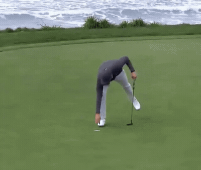 Man In Under Armour Holding Golf Club GIF