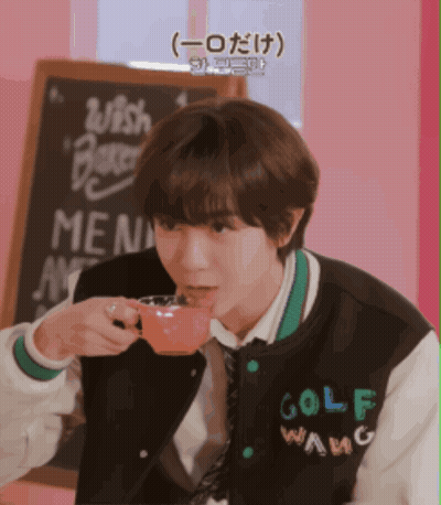 Man In Under Armour Vest Drinking From Large Cup GIF