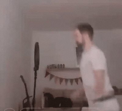 Man In Underwear Dancing In Living Room GIF