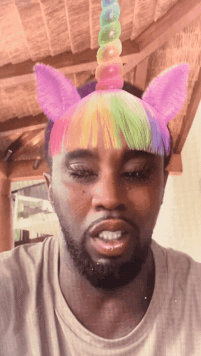 Man In Unicorn Headband With Rainbow Mane GIF
