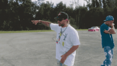 Man in USA T-Shirt in Parking Lot