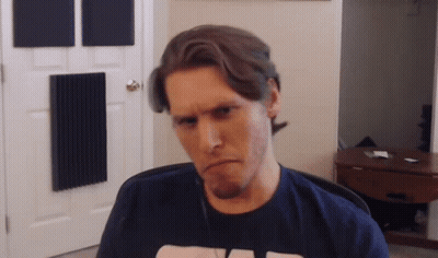 Man In V T-Shirt Making Funny Face GIF