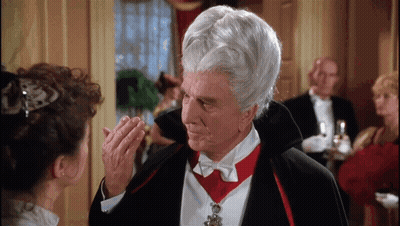 Man In Vampire Costume Looking At Woman GIF