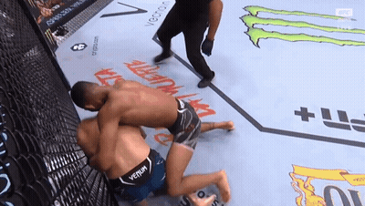 Man In Venom Shirt Wrestling Another Man GIF