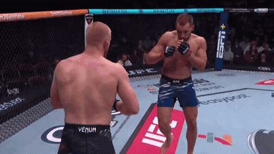 Man In Venum Shorts In Cage GIF