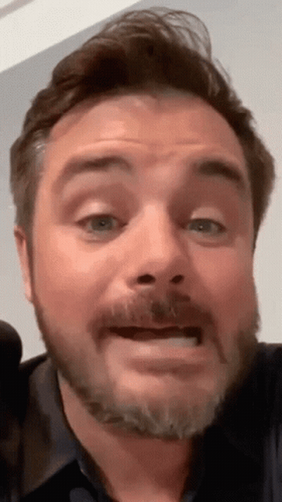 Man In Venum Shorts Lying On Ground GIF