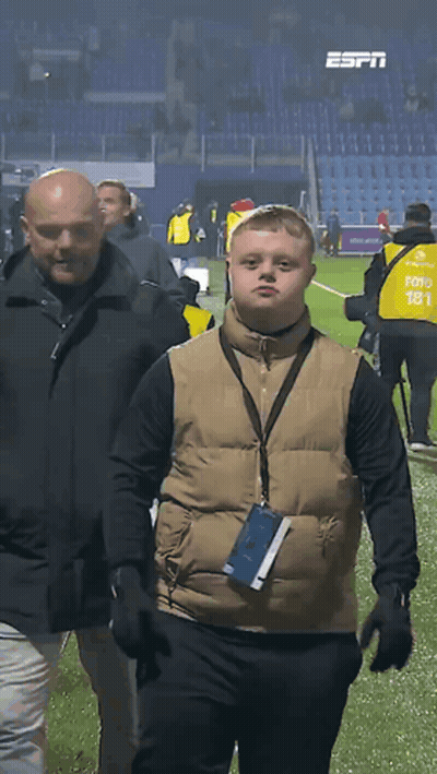 Man In Vest 181 Walking On Field GIF