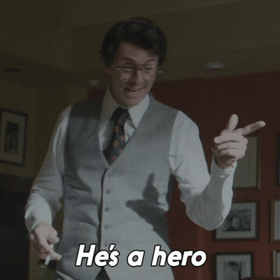 Man In Vest And Tie Saying He's A Hero GIF