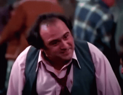 Man In Vest And Tie Smiling GIF
