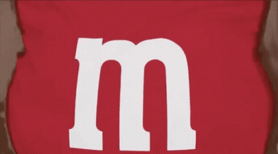 Man In Vest And Tie Smiling At Camera GIF