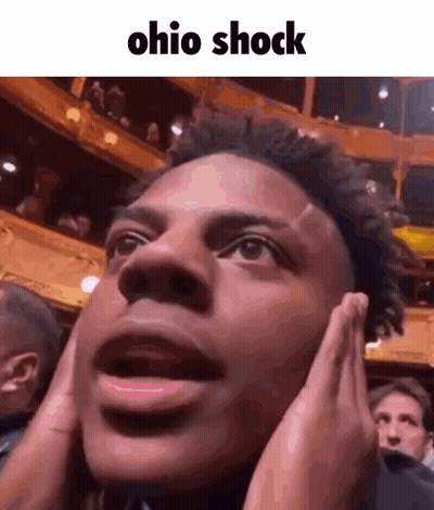 Man In Vest And White Shirt Asking Who Is He GIF