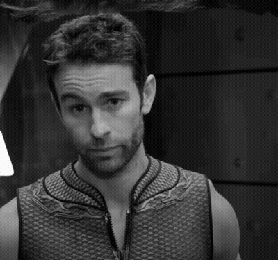 Man In Vest In Black And White GIF