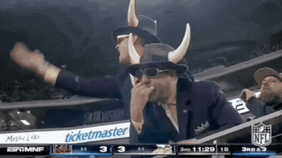 Man In Viking Hat And Sunglasses Watching Football GIF