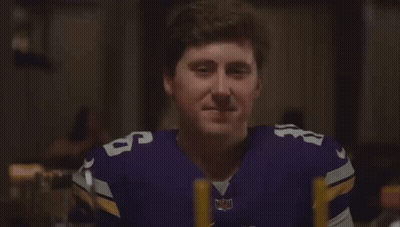 Man In Vikings Jersey Holding Head GIF