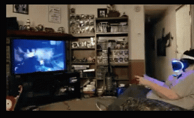 Man In Virtual Reality Headset Playing Video Game GIF