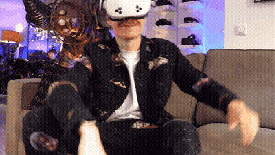 Man In VR Headset Sitting In Chair GIF