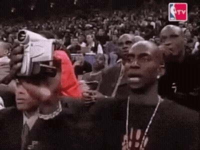 Man In VR Headset Watching Basketball Game GIF