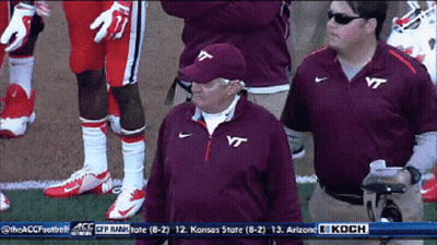 Man In VT Shirt With Football Players GIF