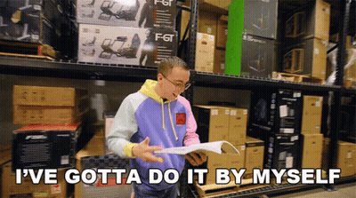 Man In Warehouse Reading Book Says I've Gotta Do It By Myself GIF