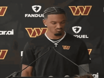 Man In Washington Redskins Shirt At Microphone GIF