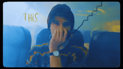 Man In Watch And Beanie Covering Face Saying This GIF