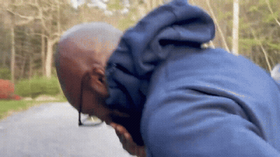 Man In Wayne Reynolds Hat With Others GIF